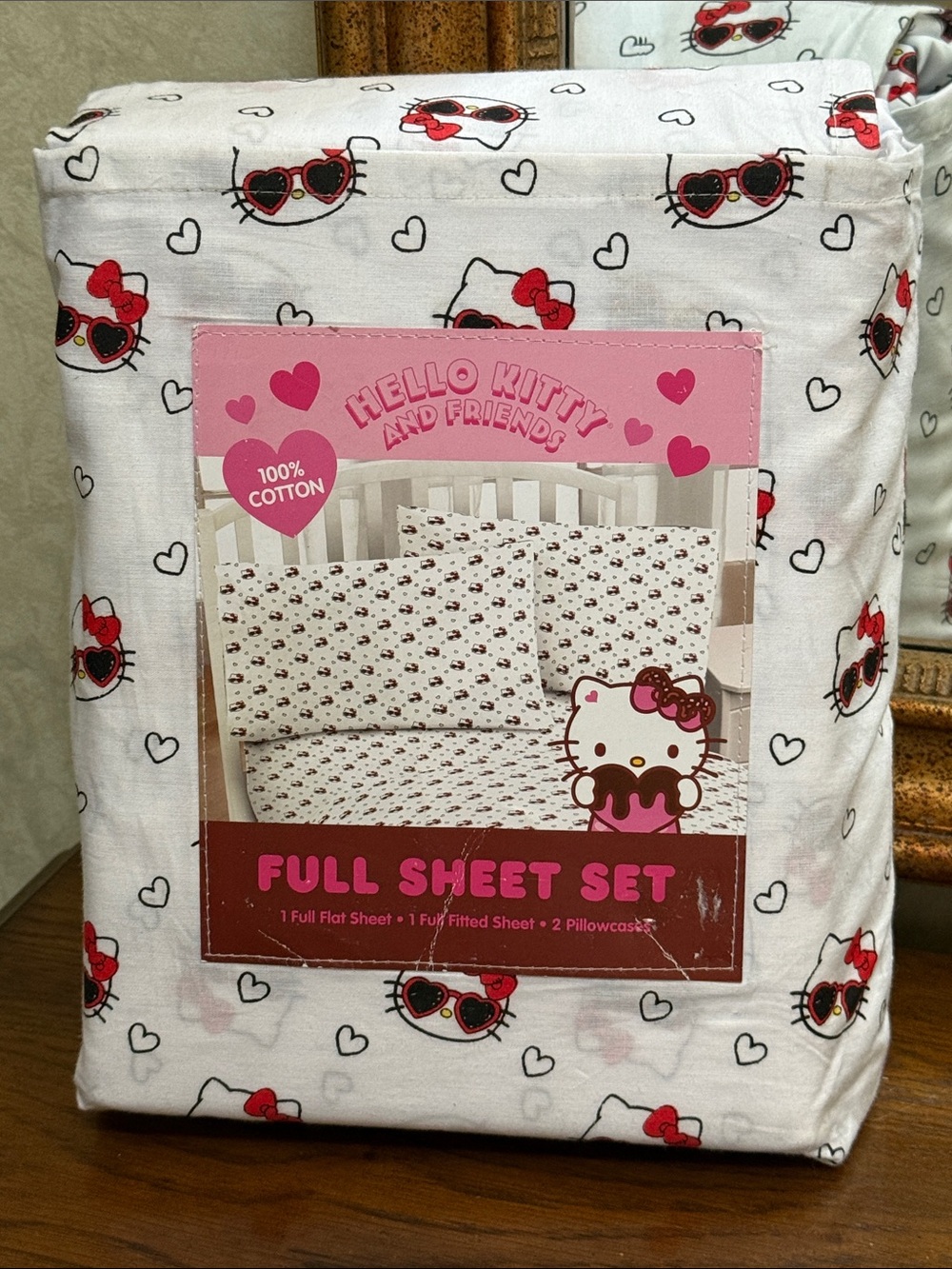 Hello Kitty Full White Sheet Set with Red and Black Accents.